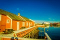 HAMMNOY, LOFOTEN, NORWAY, APRIL, 10, 2018: Outdoor view of fishing hut rorbu at the harbour in Lofoten islands Royalty Free Stock Photo