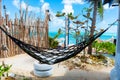 Hammock in the courtyard of the house with ocean views. Life in the tropics