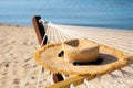 Hammock and hat  seaside. Time to relax Royalty Free Stock Photo