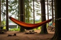 hammock hung between trees in a campsite Royalty Free Stock Photo