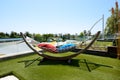 The hammock is on lawn in luxury hotel