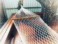 Hammock in the leisure corner in the garden.