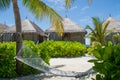 Hammock near bungalos at Maldives Royalty Free Stock Photo