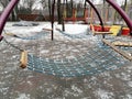 Hammock net on the playground. Hammock made of metal mesh for children. Hammock swing for children on the playground. Royalty Free Stock Photo