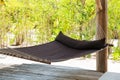 Hammock on tropical beach terrace