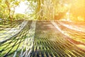 Hammock under the tree in garden for relaxation