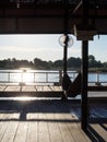 Hammock in wood house near river before sunset in Lao