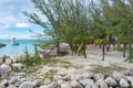 Hammocks, beach, ocean, and a boat Royalty Free Stock Photo