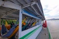 Hammocks on passengers deck on cattle pontoon boat on Rio Paraguay river, Corumba, Pantanal, Mato Grosso, Brazil Royalty Free Stock Photo