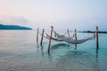 Hammocks spread out for tourists to lie down in the sea in front of Ao Phrao Beach, Koh Kood Royalty Free Stock Photo