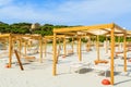 Hammocks and sunbeds on sandy Porto Giunco beach, Sardinia island, Italy Royalty Free Stock Photo