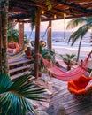 Hammocks on a wooden deck overlooking the ocean Royalty Free Stock Photo