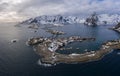 Hamnoy Village and Mountains in Winter. Norwegian Sea and Stormy Sky. Moskenes, Lofoten Islands, Norway. Aerial View