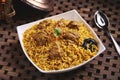 Hamour Machboos biryani served in dish isolated on table side view of middle east food Royalty Free Stock Photo