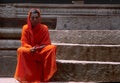 Hampi, India: Pilgrim sitting inside hindu temple Royalty Free Stock Photo