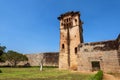 Zanana Enclosure with watch tower in back under blue cloudscape. Hampi, Karnataka, India