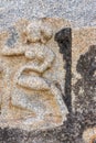 Sculpture on stone of faded woman Royal Enclosure, Hampi, Karnataka, India