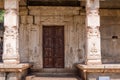 Dark brown wooden door at Nandi Monolith temple, Hampi, Karnataka, India