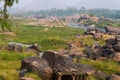 Hampi village Tungabhadra river meadow. Landscape with water, palm, rock, stones. India, Karnataka Royalty Free Stock Photo