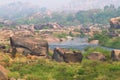 Hampi village Tungabhadra river meadow. Landscape with water, palm, rock, stones. India, Karnataka Royalty Free Stock Photo