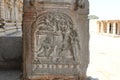 Hampi Vittala Temple pillar carving of hanuman meeting sita or human guarded by demon, monkey watching from tree top