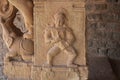 Hampi Vittala Temple pillar carving of a man or demon holding a horn