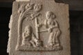 Hampi Vittala Temple stone pillar carving of Bala baby krishna eating butter