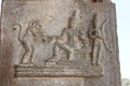 Hampi Vittala Temple Stone Pillar Carving of Raama human, Lakshman human and Hanuman the monkey god giving the ring of Sita