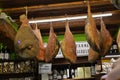 Hams hung in an Italian shop