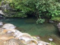 Hanakapiai Stream Close to Hanakapiai Falls on NaPali Coast along Kalalau Trail on Rainy and Misty Day on Kauai Island, Hawaii. Royalty Free Stock Photo