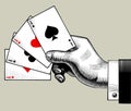 Hand with ace playing cards fan. Vintage engraving stylized draw Royalty Free Stock Photo