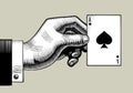 Hand with the ace of Spades playing card. Vintage engraving stylized drawing. Royalty Free Stock Photo