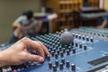 Hand adjusting audio mixer Royalty Free Stock Photo