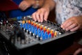 Hand adjusting audio mixer Royalty Free Stock Photo