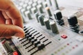 Hand adjusting audio mixer Royalty Free Stock Photo