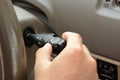 Hand adjusting car headlight control switch Royalty Free Stock Photo