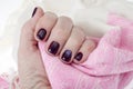 Hand of an adult woman with painted nails, manicure, nail polish Royalty Free Stock Photo
