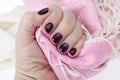 Hand of an adult woman with painted nails, manicure, nail polish Royalty Free Stock Photo