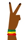 Hand of african woman wearing a flag of Ethiopia showing victory sign