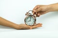 Hand and alarm clock Royalty Free Stock Photo