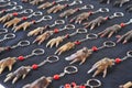 hand amulet of monkey animal in extinction as handmade keychain sale in the amazon jungle iquitos peru