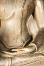 Hand of an ancient Buddha image at thailand