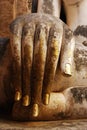 Hand of Ancient Buddha Statue Royalty Free Stock Photo