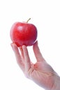 Hand and apple Royalty Free Stock Photo
