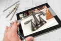 Hand of Architect on Computer Tablet Showing Bathroom Details Ov Royalty Free Stock Photo