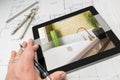 Hand of Architect on Computer Tablet Showing Bathroom Details Ov Royalty Free Stock Photo