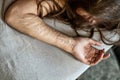 Hand, arm and hair of a Woman with heavy Cuts and scars of self-mutilation, self-abusing, Borderline personality disorder, copy Royalty Free Stock Photo