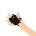 Hand arm holding black cat. Adopt animal pet. Helping hands concept. Funny gift. Cute cartoon character. Close up body part. Flat Royalty Free Stock Photo