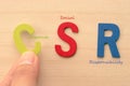 Hand arrange letters as CSR Royalty Free Stock Photo