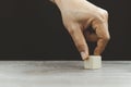 Hand arranging wood block stacking as step stair on wooden table. Business concept for growth success process. Copy space Royalty Free Stock Photo